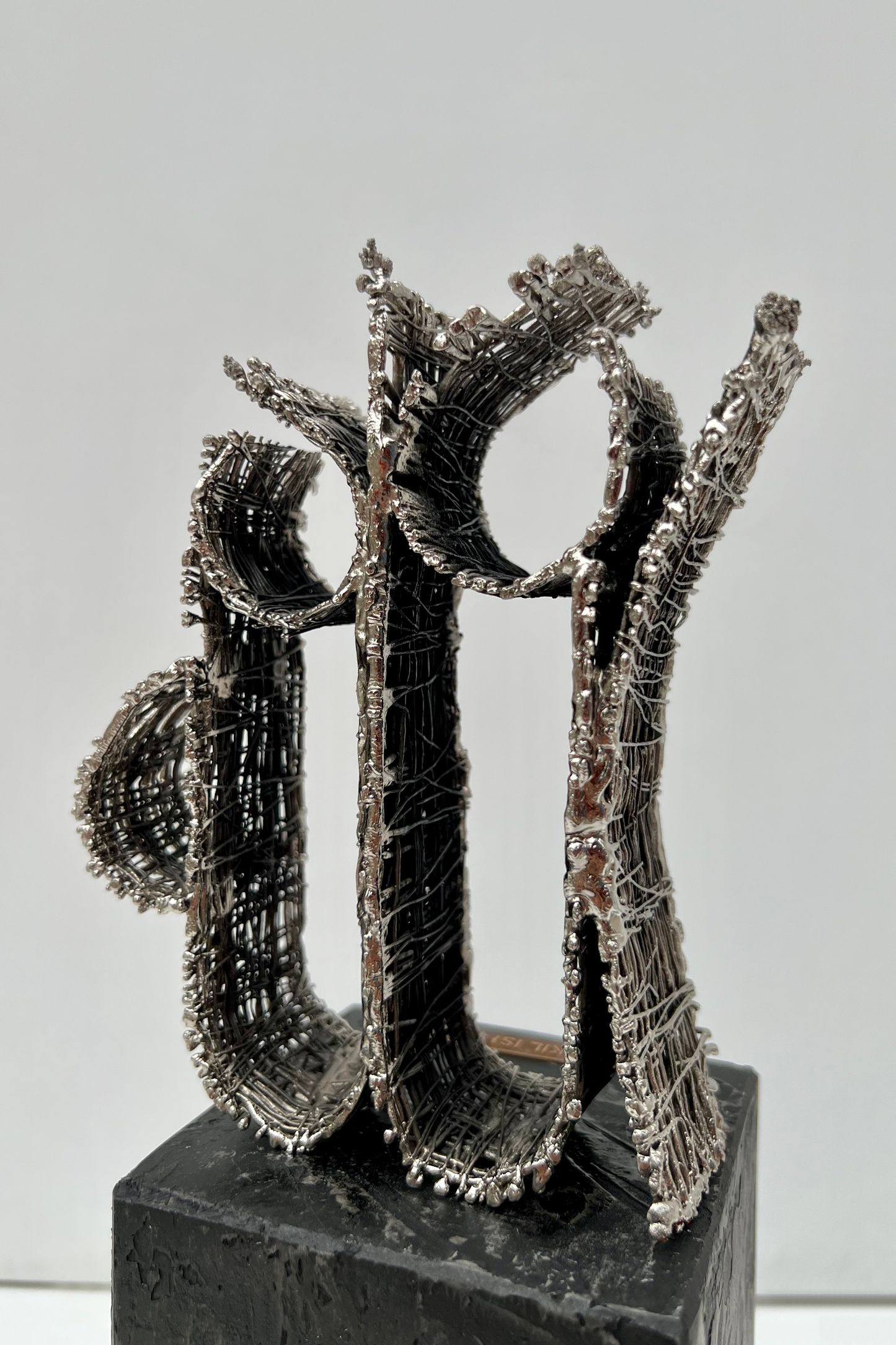 Divine Tangle: Wire-Formed Allah Sculpture